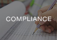 Image: hand writing on a pad with the word compliance, click to access the on-demand compliance videos