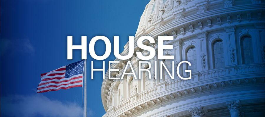 Image of capitol building with American flag in the breeze with text that reads "House Hearing"